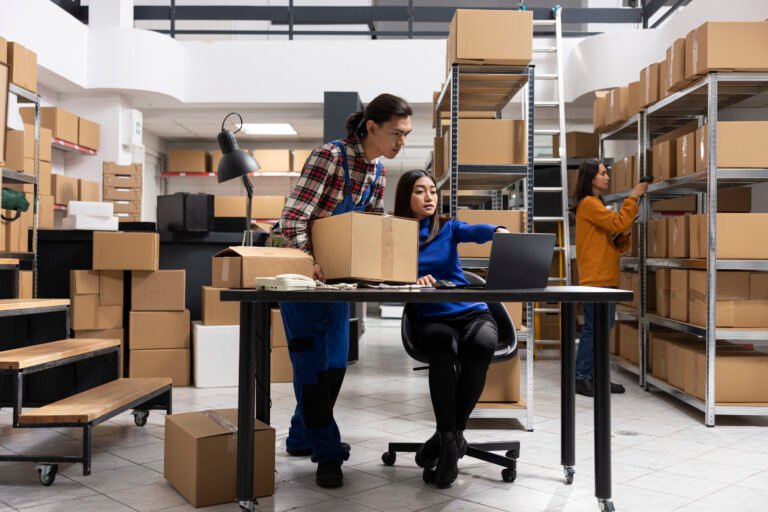 Home business employees preparing products and boxes for local delivery